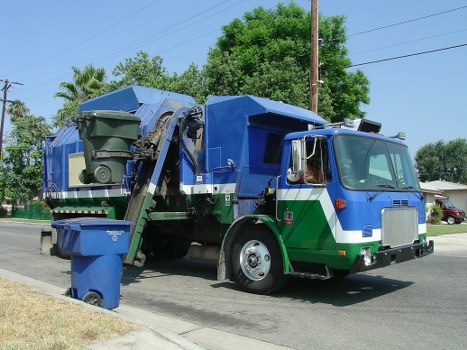 Investigator inspecting skip placement at a site
